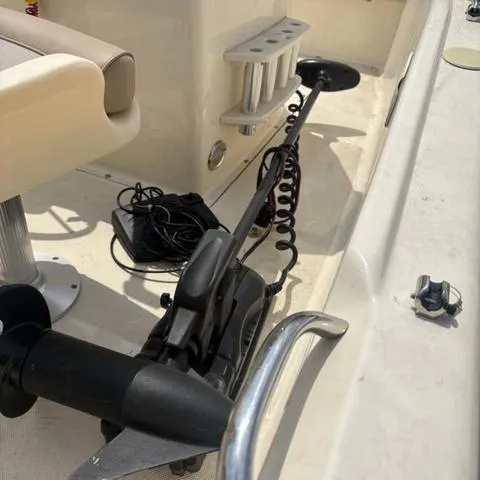 Slide: The Image of 2014 Scout 175 Sportfish boat interior with trolling motor and seating. - 11