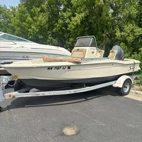 Slide: The Image of "Pictures coming soon" text over scenic lake background. Scout 175 Sportfish 2014 model. - 1