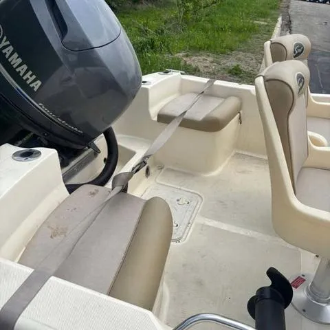 Slide: The Image of 2014 Scout 175 Sportfish boat interior with Yamaha engine and seating. - 5
