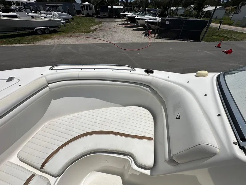 Slide: The Image of 2008 Sea Fox 216 Dual Console boat interior with steering wheel and seating. - 19