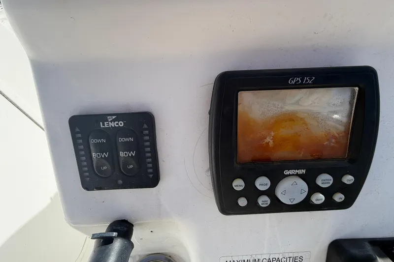Slide: The Image of Control panel of 2008 Sea Fox 216 Dual Console with Lenco and Garmin GPS 152. - 26