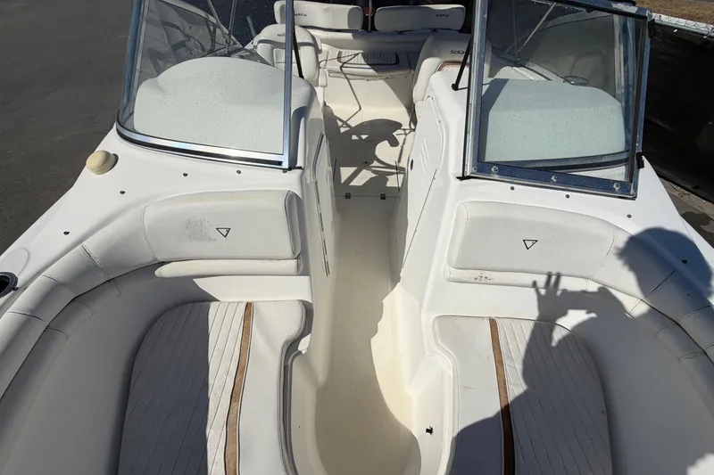 Slide: The Image of 2008 Sea Fox 216 Dual Console boat interior with white seating and windshield. - 40