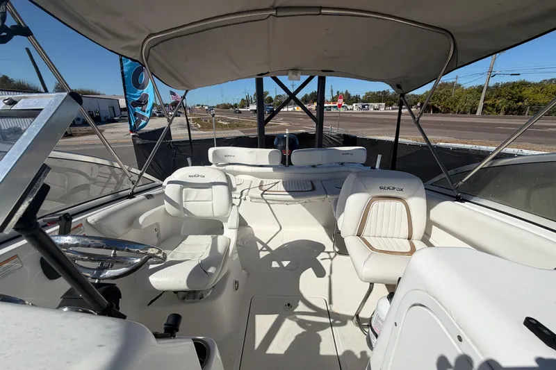 Slide: The Image of 2008 Sea Fox 216 Dual Console boat interior with seating and steering wheel. - 43