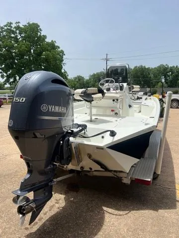 Slide: The Image of 2017 Excel 22' Pleasure boat with Yamaha 150 engine, parked outdoors. - 13