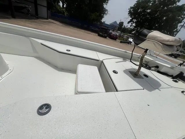 Slide: The Image of 2017 Excel 22' Pleasure boat interior with seating and storage compartments. - 6