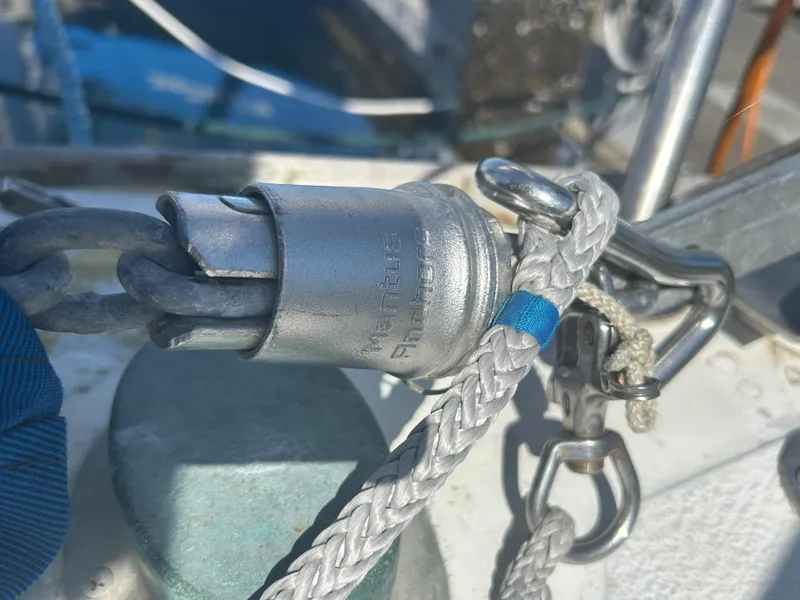 Slide: The Image of Rope and metal fitting on a 1973 Challenger Cruiser boat deck. - 11