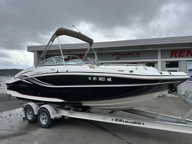 Slide: The Image of 2015 Hurricane SD 2400 I/O boat on trailer, parked outside Mark's rental shop. - 1