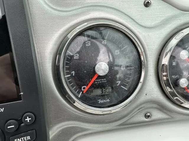 Slide: The Image of Close-up of 2015 Hurricane SD 2400 I/O boat dashboard with RPM gauge. - 16