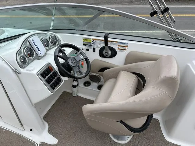 Slide: The Image of 2015 Hurricane SD 2400 I/O boat cockpit with steering wheel and control panel. - 20