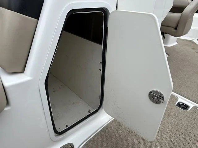 Slide: The Image of Open storage compartment on 2015 Hurricane SD 2400 I/O boat. - 31