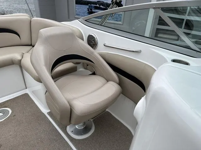 Slide: The Image of 2015 Hurricane SD 2400 I/O boat interior with beige seating and modern design. - 33