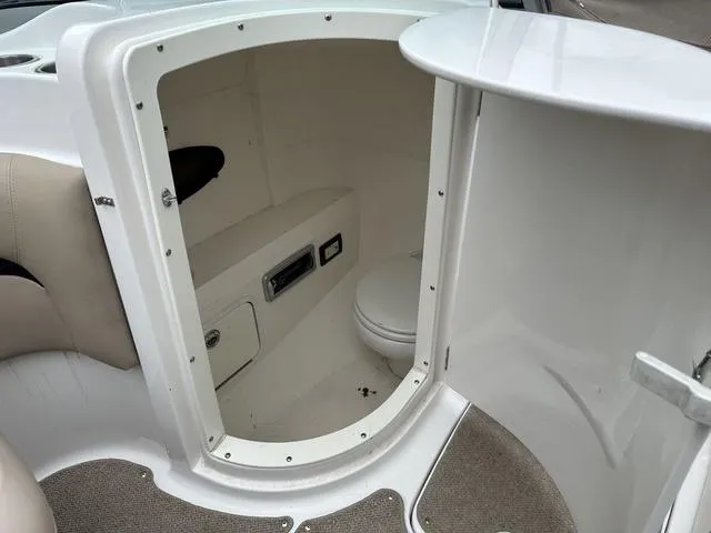 Slide: The Image of 2015 Hurricane SD 2400 I/O boat interior with compact restroom. - 38