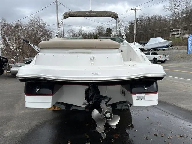 Slide: The Image of 2015 Hurricane SD 2400 I/O boat, rear view, parked outdoors. - 4