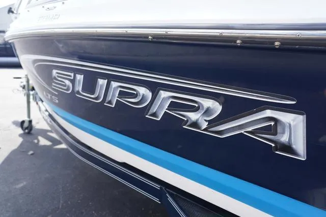 Slide: The Image of 2004 Supra COMP LTS/SK boat with bold logo on the side. - 5