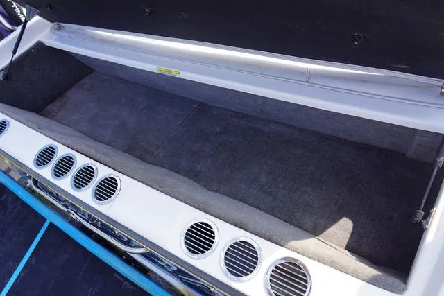 Slide: The Image of 2004 Supra COMP LTS/SK boat storage compartment with ventilation vents. - 6