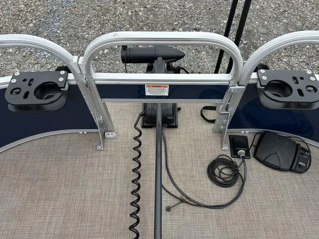 Slide: The Image of 2023 Sun Tracker Bass Buggy® 16 XL Select deck with fishing rod holders and trolling motor. - 12
