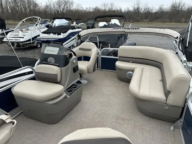 Slide: The Image of 2023 Sun Tracker Bass Buggy® 16 XL Select pontoon boat interior with beige seating. - 24