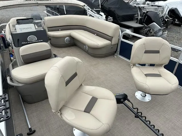 Slide: The Image of 2023 Sun Tracker Bass Buggy® 16 XL Select pontoon boat with beige seating and modern design. - 25
