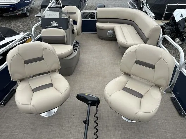 Slide: The Image of 2023 Sun Tracker Bass Buggy® 16 XL Select pontoon boat interior with beige seating. - 26