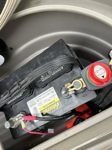 Slide: The Image of Battery compartment of 2023 Sun Tracker Bass Buggy® 16 XL Select with marine battery. - 30