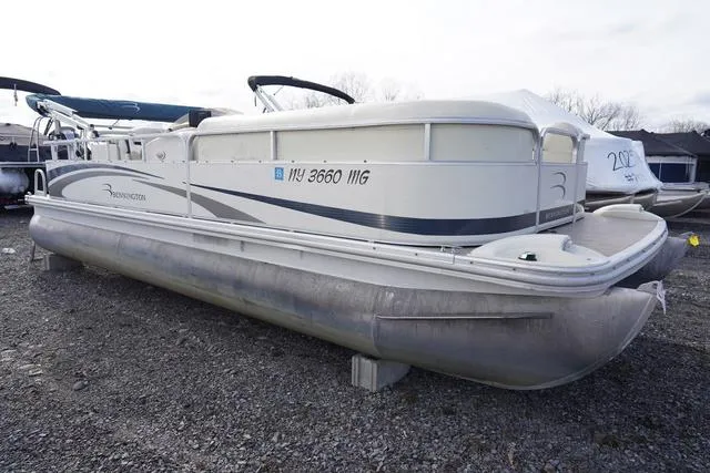 Slide: The Image of 2008 Bennington 2250 pontoon boat on gravel lot, side view. - 3