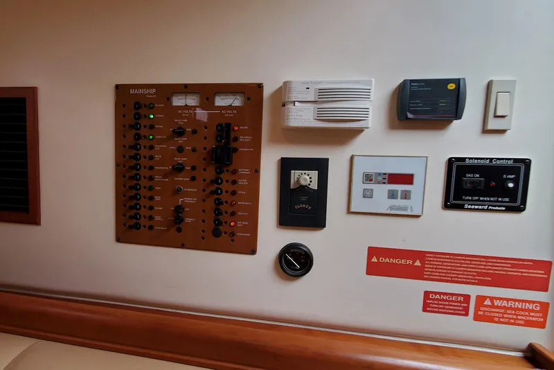 Slide: The Image of Control panel of a 2006 Mainship 34 Rum Runner classic boat interior. - 29