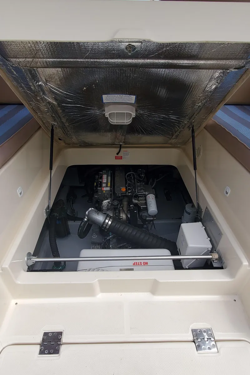 Slide: The Image of Engine compartment of 2006 Mainship 34 Rum Runner Classic boat. - 30