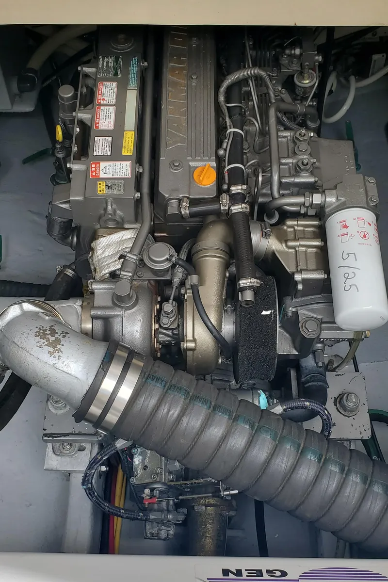 Slide: The Image of Engine of 2006 Mainship 34 Rum Runner Classic boat, detailed view. - 31