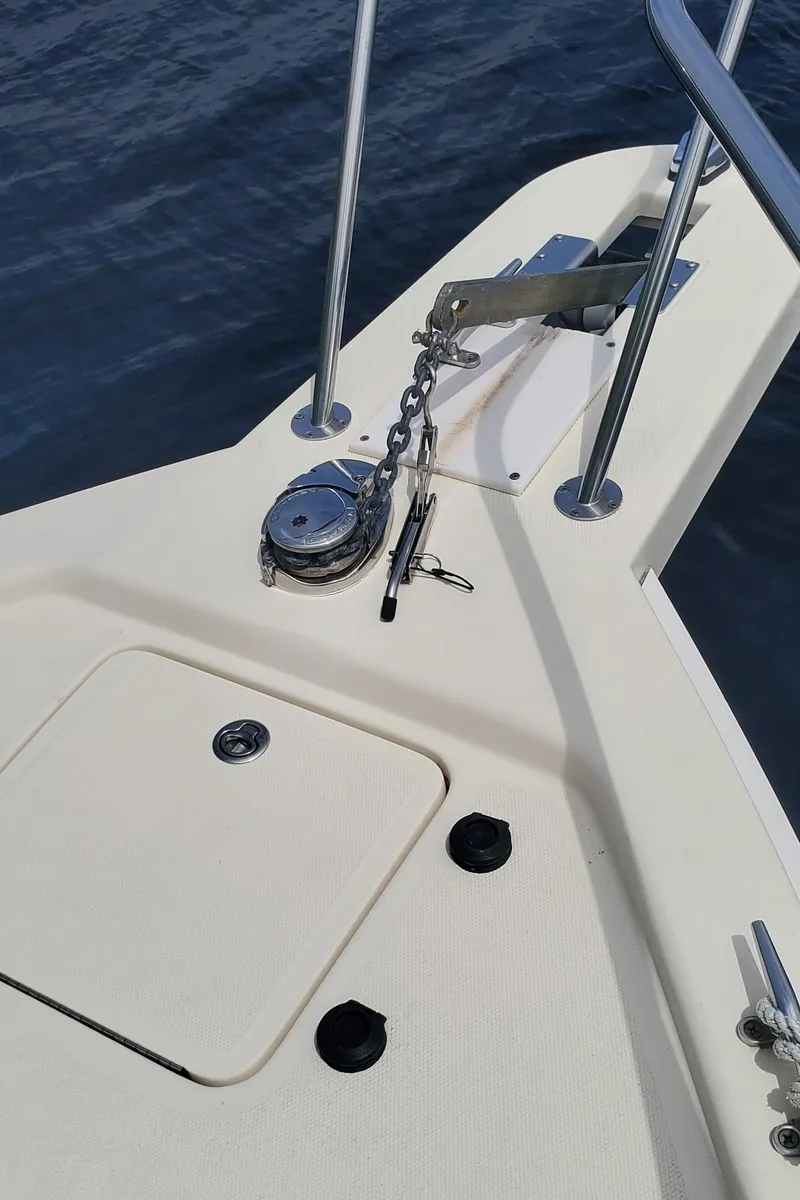 Slide: The Image of Bow of 2006 Mainship 34 Rum Runner classic with anchor chain and fittings. - 8