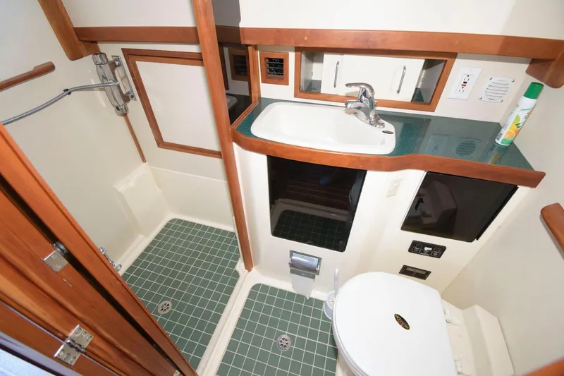 Slide: The Image of Bathroom interior of 2000 Sabreline 47 Motor Yacht with shower and sink. - 35