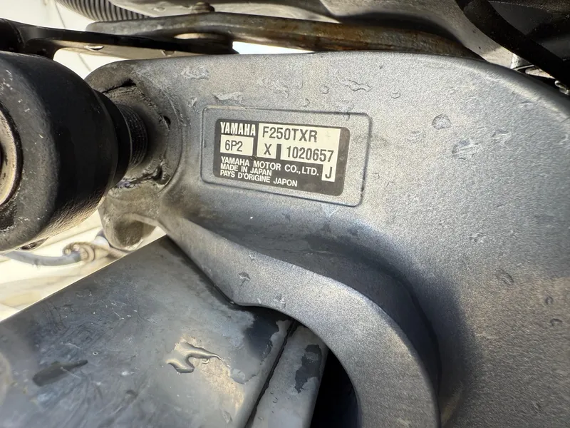 Slide: The Image of Yamaha F250TXR engine detail on 2004 Aquasport 250 Explorer boat. - 26