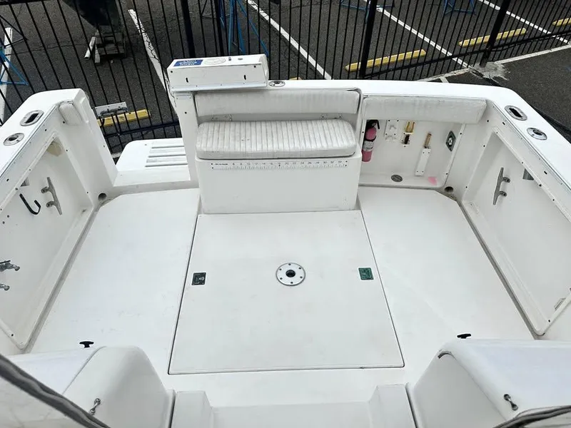 Slide: The Image of 1997 Phoenix 32 Tournament boat deck with seating and storage compartments. - 5