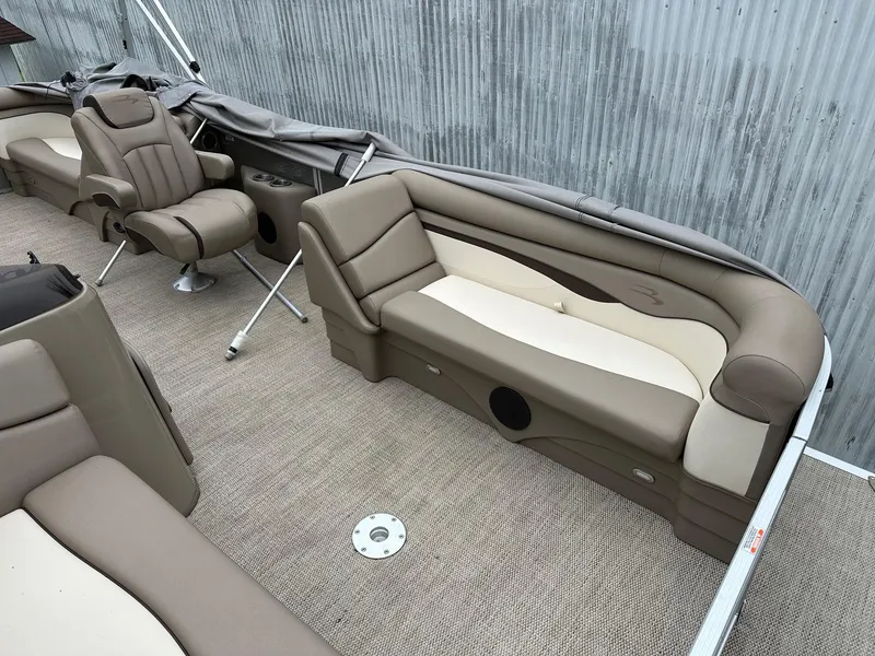 Slide: The Image of 2019 Bennington 22 SSR Quad Bench interior with plush seating and modern design. - 3