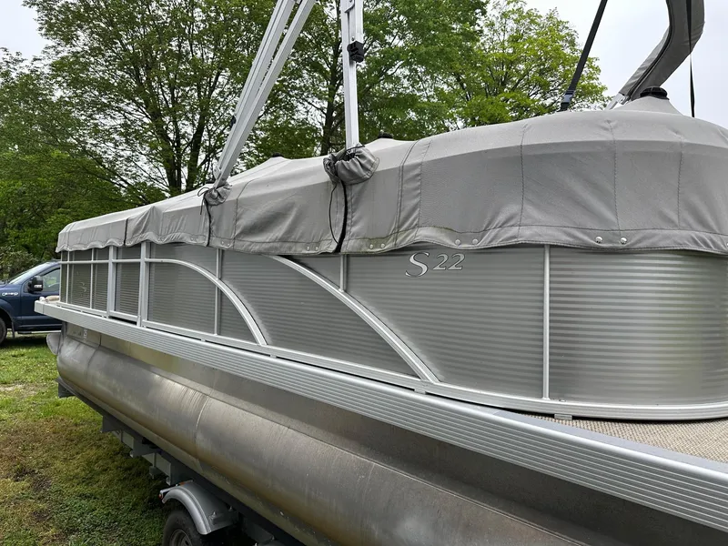 Slide: The Image of 2019 Bennington 22 SSR Quad Bench pontoon with cover on trailer. - 4