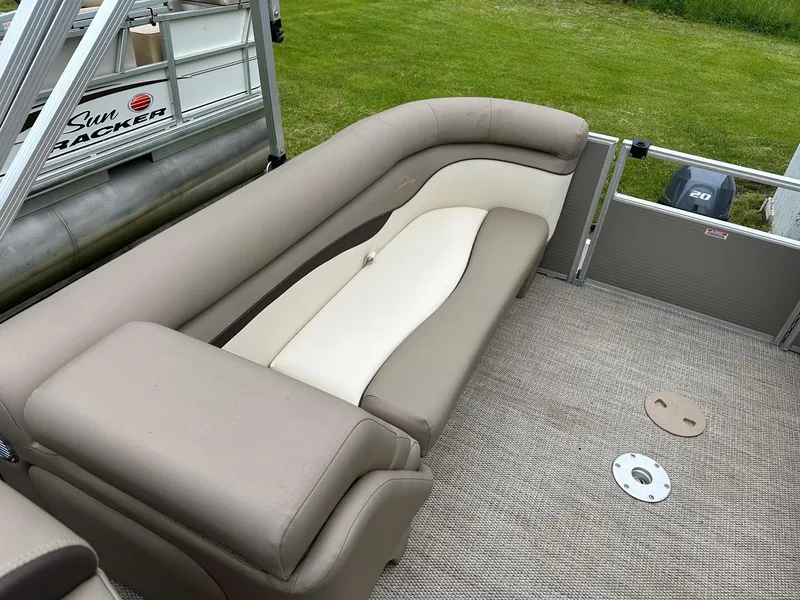 Slide: The Image of 2019 Bennington 22 SSR Quad Bench interior with Yamaha 25Hp engine, featuring comfortable seating. - 9