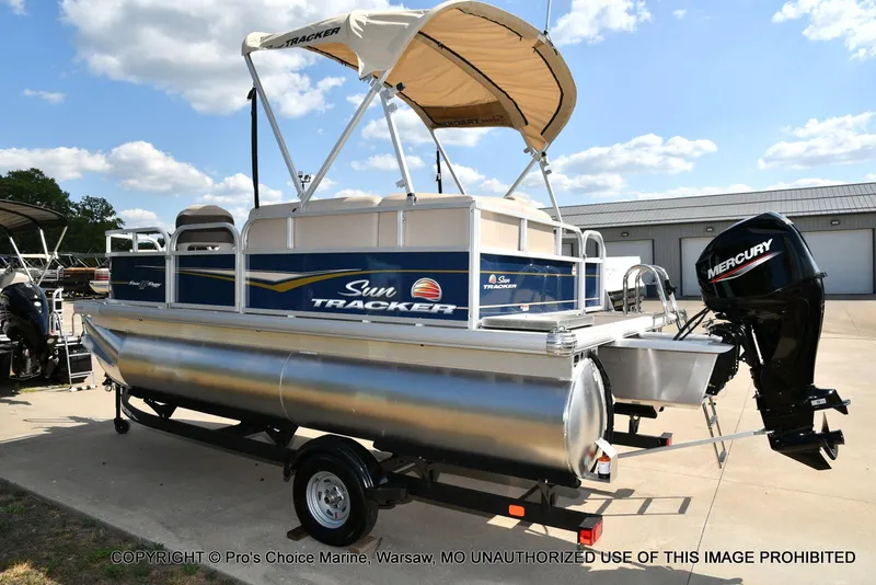 Slide: The Image of 2025 Sun Tracker Bass Buggy 16 XL Select pontoon boat with Mercury outboard motor. - 12