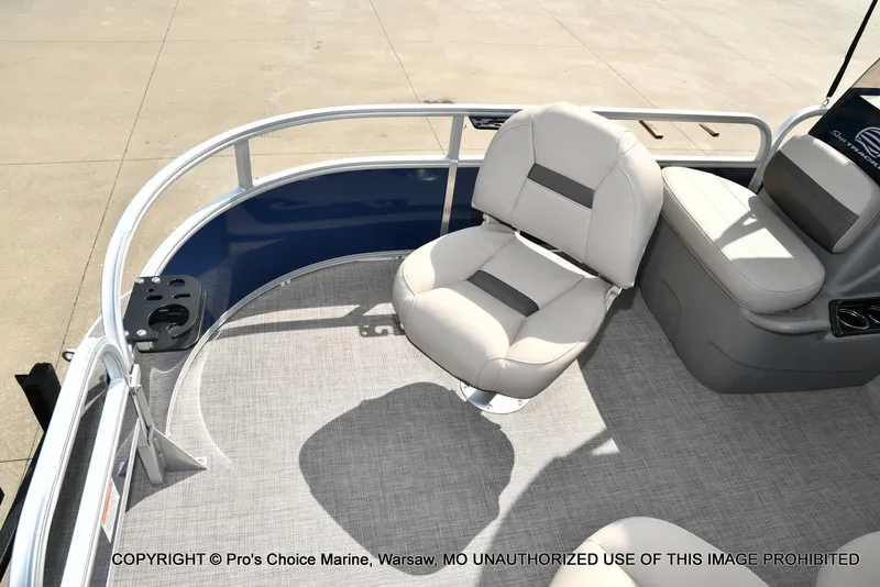 Slide: The Image of 2025 Sun Tracker Bass Buggy 16 XL Select pontoon boat interior with seating and railing. - 20