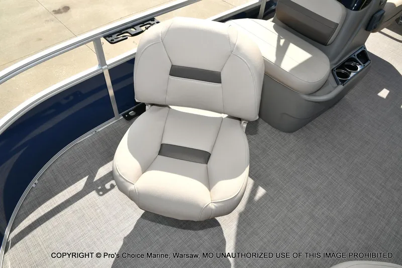 Slide: The Image of 2025 Sun Tracker Bass Buggy 16 XL Select boat seat with gray upholstery and cup holders. - 21