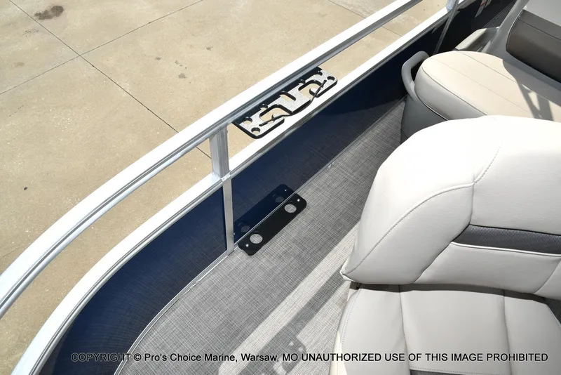 Slide: The Image of Interior view of 2025 Sun Tracker Bass Buggy 16 XL Select pontoon boat seating area. - 23