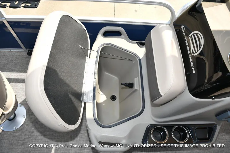 Slide: The Image of 2025 Sun Tracker Bass Buggy 16 XL Select boat interior with storage compartment and seating. - 27