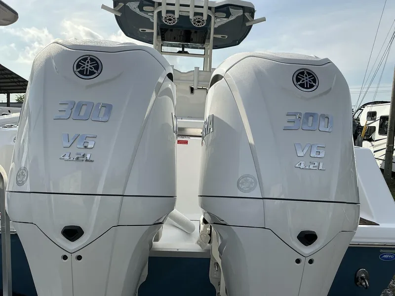 Slide: The Image of Twin Yamaha 300 V6 4.2L engines on a 2025 Tidewater 282CC boat. - 5