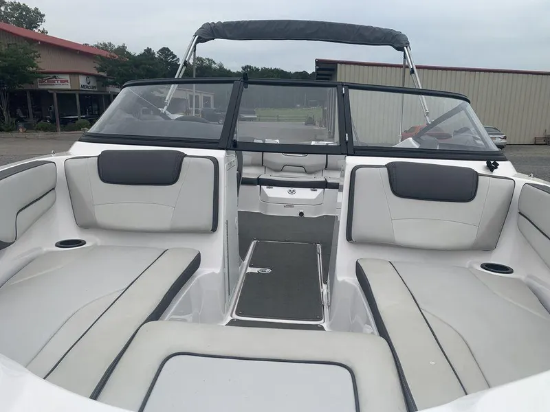 Slide: The Image of 2021 Yamaha Boats SX190 interior with spacious seating and modern design. - 2