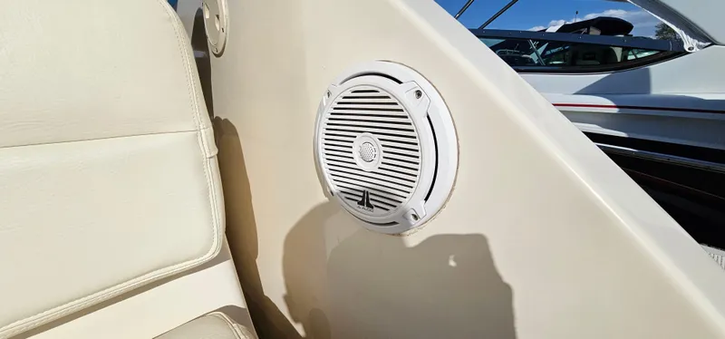 Slide: The Image of Speaker on 1994 Tiara Yachts 3100 Open, beige interior, partial seat view. - 13