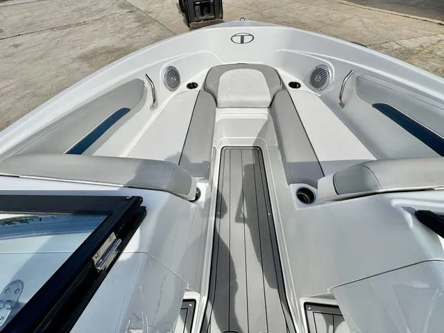 Slide: The Image of 2023 Tahoe 210 Si boat interior with sleek seating and modern design. - 13