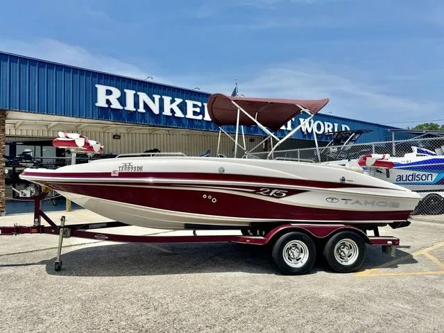 Slide: The Image of 2014 Tahoe 215 Xi boat on trailer at Rinker Boat World dealership. - 2