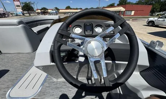 Slide: The Image of Steering wheel and dashboard of 2023 Bennington SX Fish 22 SXFAPG boat. - 17