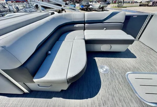 Slide: The Image of 2023 Bennington SX Fish 22 SXFAPG boat interior with gray seating and modern design. - 19