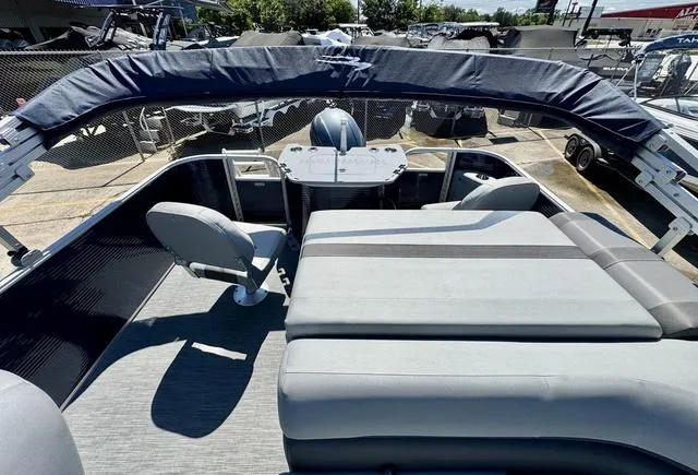 Slide: The Image of 2023 Bennington SX Fish 22 SXFAPG pontoon boat with spacious seating and modern design. - 20