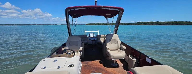 Slide: The Image of 2017 South Bay 500 boat on calm blue water under clear sky. - 10