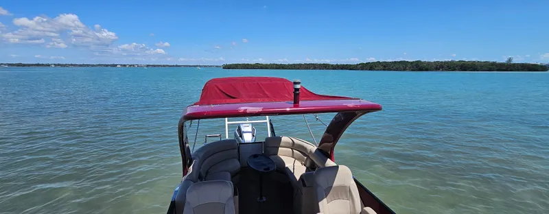 Slide: The Image of 2017 South Bay 500 boat on clear blue water under a sunny sky. - 11